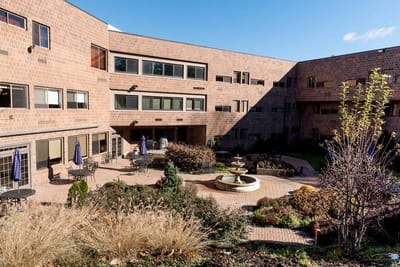 Outdoor courtyard with seating and fountain