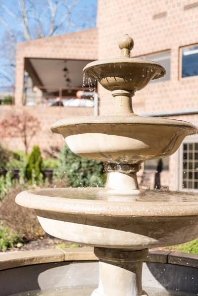 Fountain in the garden area of the facility
