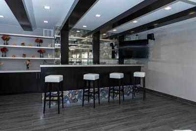 Modern common area with bar seating and decor