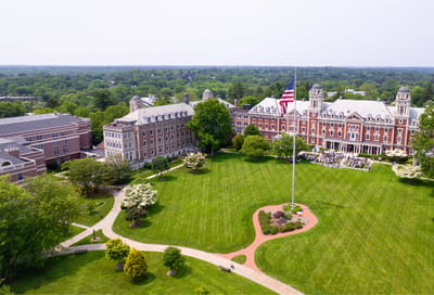Aerial view of The Osborn with American flag in front yard