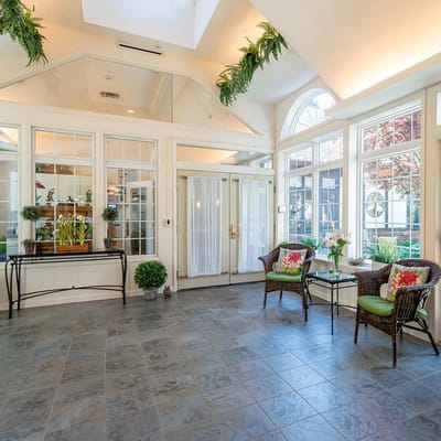 Bright lobby area with seating and plants