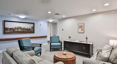 Cozy common area with seating and artwork