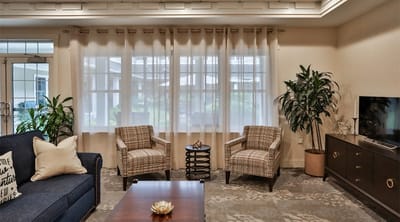 A cozy common area with seating and natural light