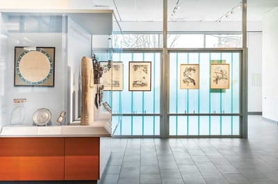 RiverSpring Living, nursing home in Bronx, NY — Art gallery interior with exhibits and natural light