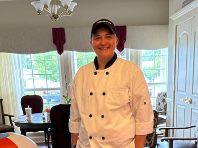 Staff chef in a kitchen area of the facility