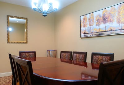 Interior view of a dining room with a large table