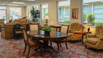 Comfortable common area with seating and a dining table