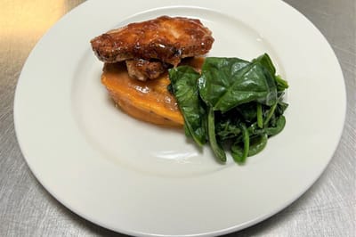 Delicious plated meal of chicken with vegetables