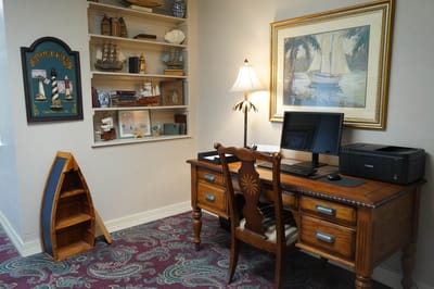 A cozy office space with desk and decor