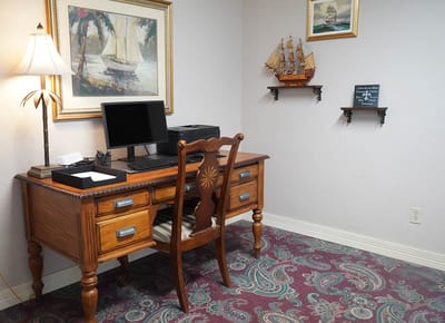 Cozy office space with a wooden desk and decor
