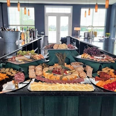 A beautifully arranged charcuterie spread in a dining area