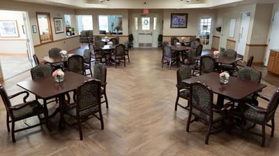 Dining room with tables and chairs in a cozy setting