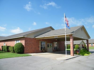 Exterior view of Tamarack Retirement Center building