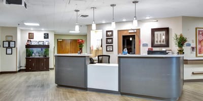 Interior view of the reception area with a front desk