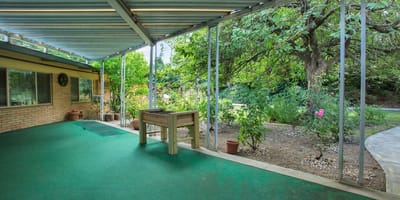 Outdoor area with greenery and seating