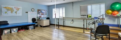 Therapy room equipped with exercise equipment