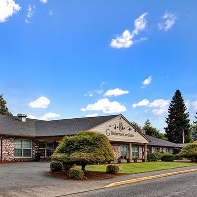 Exterior view of Timberline Care Center with landscaped front