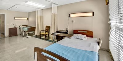 A private resident room with two beds