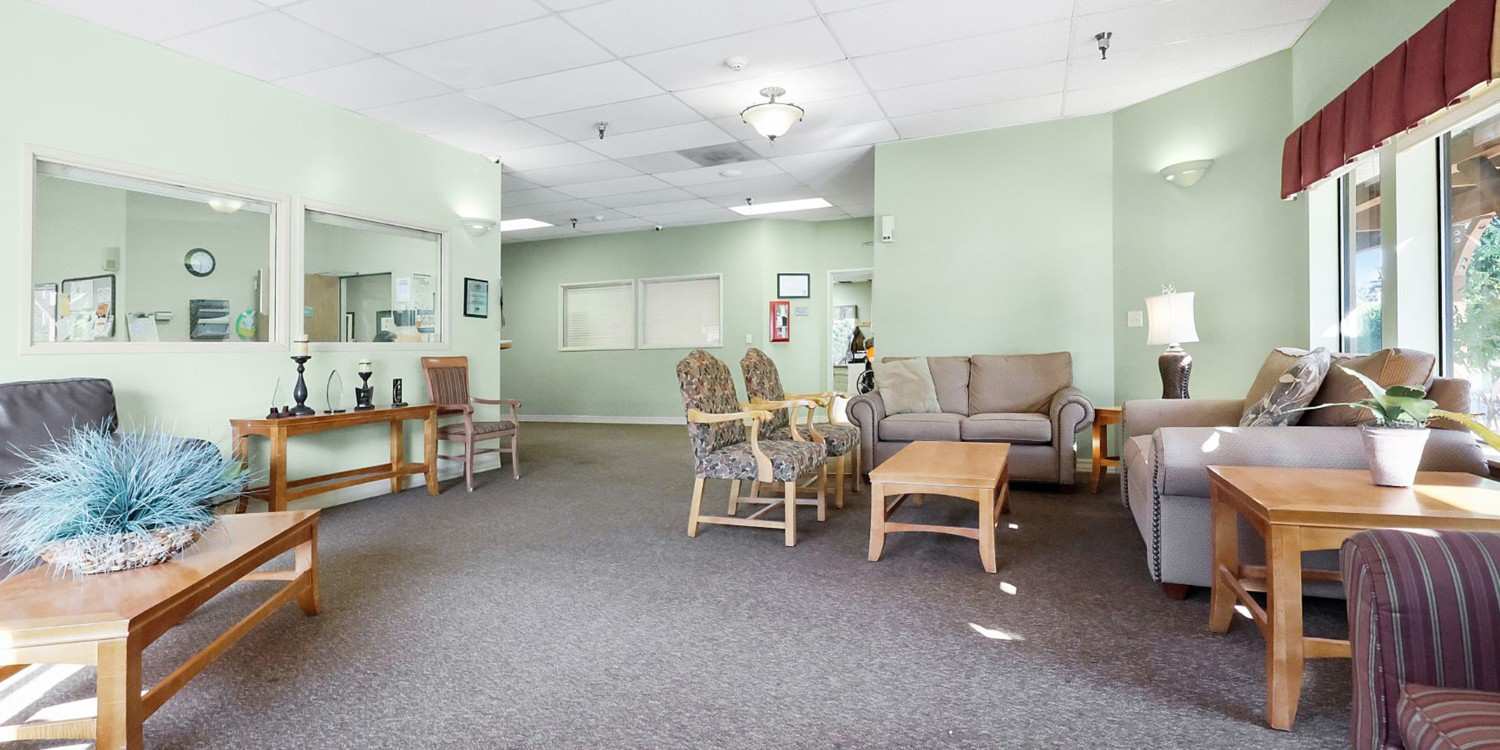 Bright common area with seating and decor