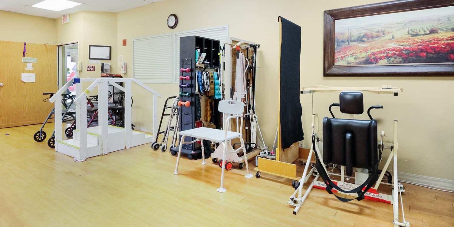 Interior view of a physical therapy area with equipment