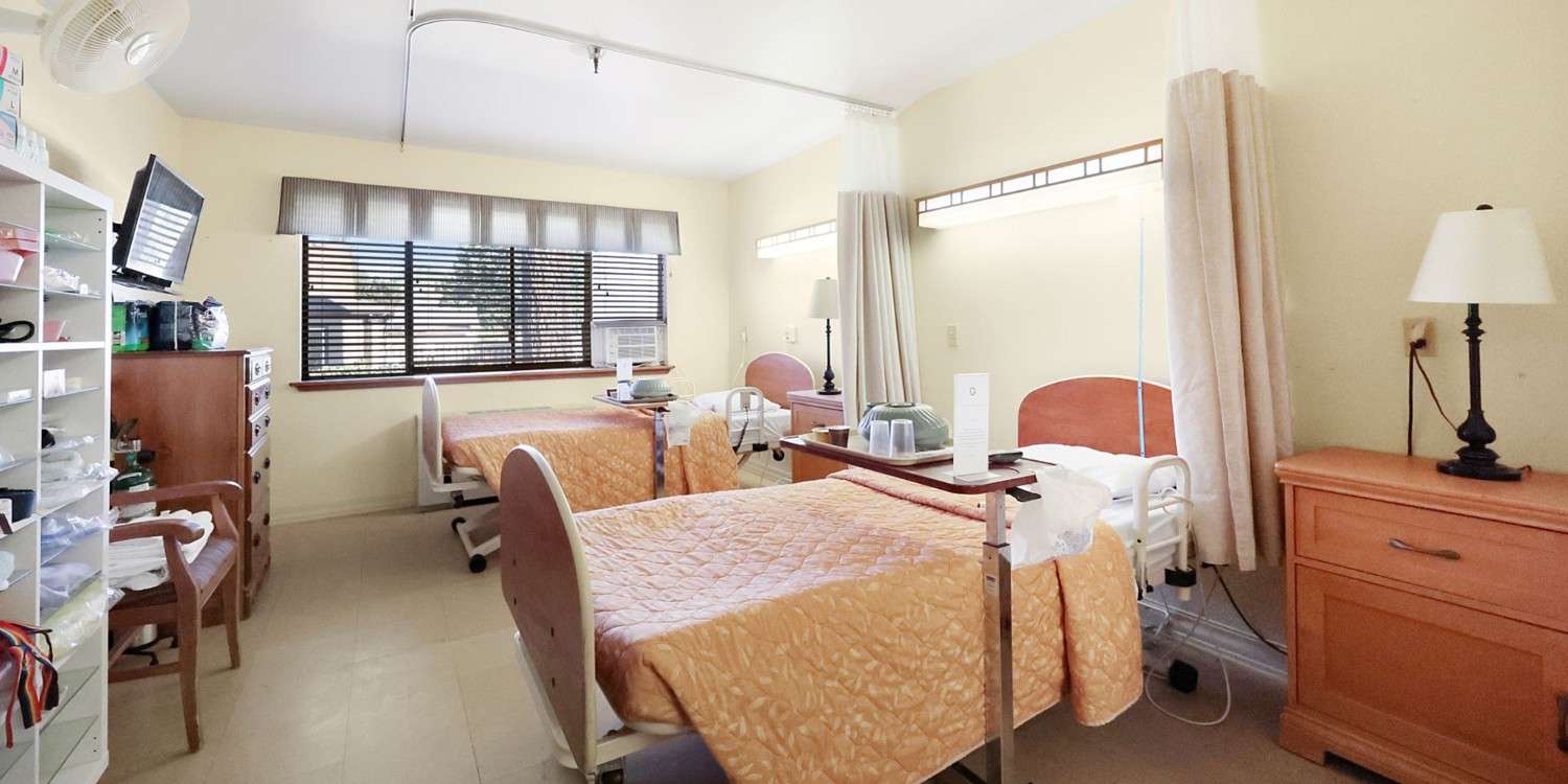 Interior view of a resident room with two beds