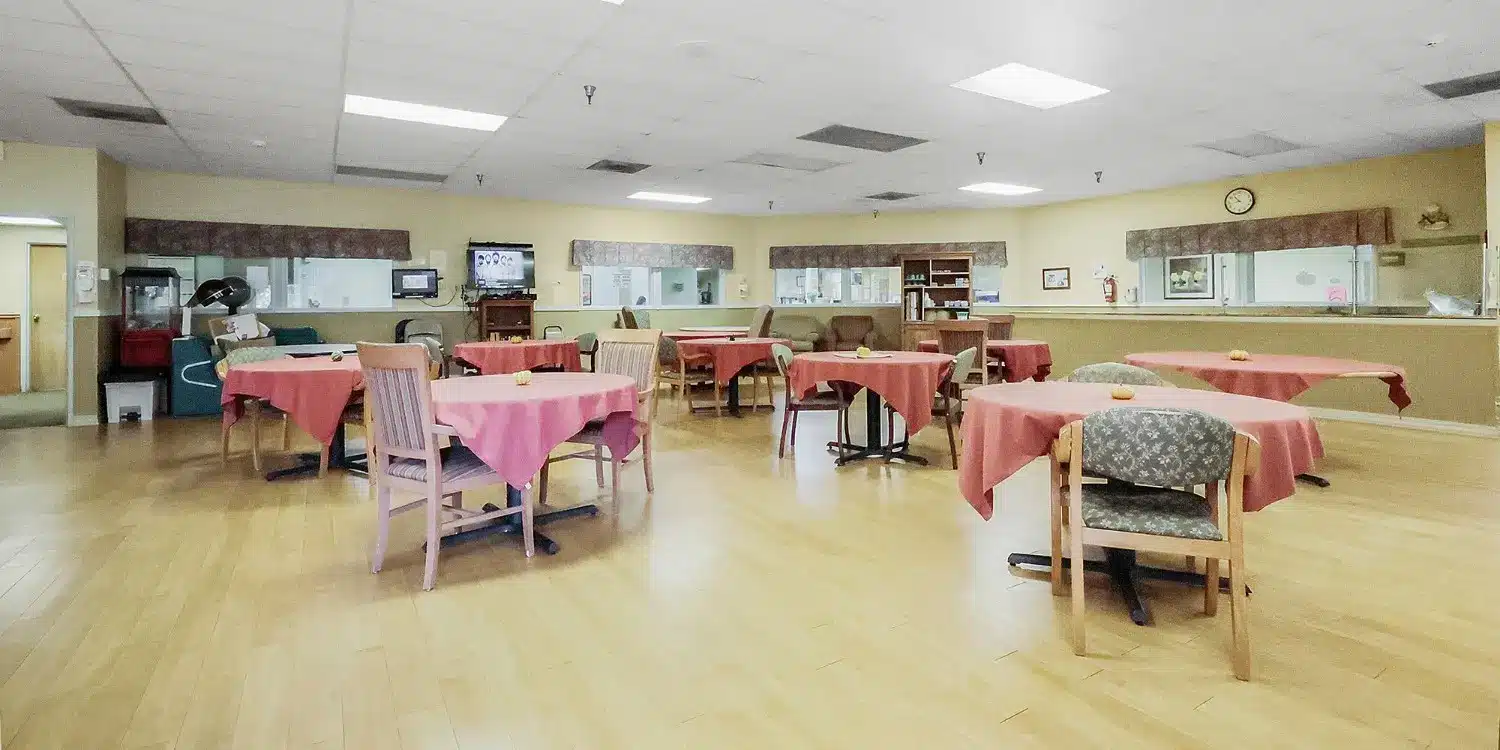 Dining area with empty tables and chairs