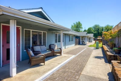 Outdoor patio area with seating and pathway