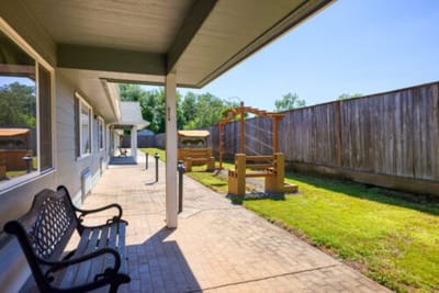 Outdoor space with seating and garden area