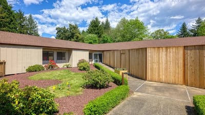 Outdoor courtyard with landscaping and pathways