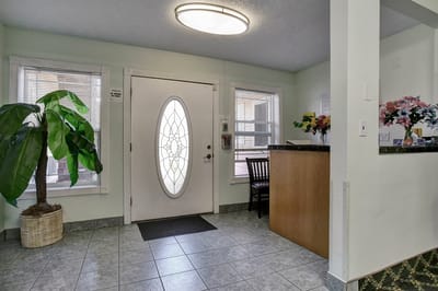 Bright and welcoming reception area with seating and plants