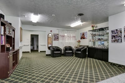 Cozy common area with seating and decor in a senior living facility
