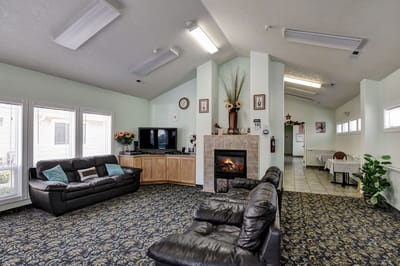 Cozy common area with seating and a fireplace