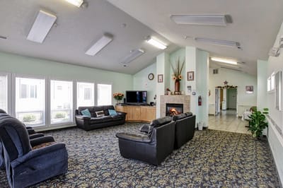 Common area with seating and a fireplace