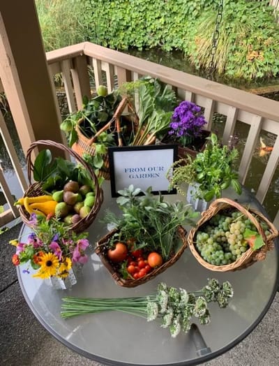 Baskets of fresh produce displayed in a garden