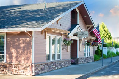 Exterior view of Countryside Living facility with American flag