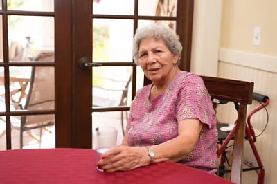 Senior resident enjoying a moment in a common area
