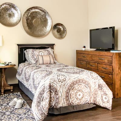 Cozy private bedroom with decorative accents