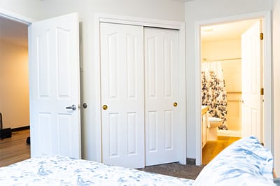 Interior view of a resident room with bathroom
