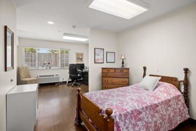 Cozy private room with a bed and desk