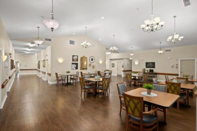Interior view of a common area with tables and chairs