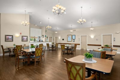 Bright dining area with tables and chairs