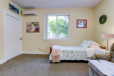 Cozy resident room with a bed and decor
