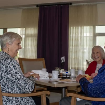 Residents enjoying time together in a common area