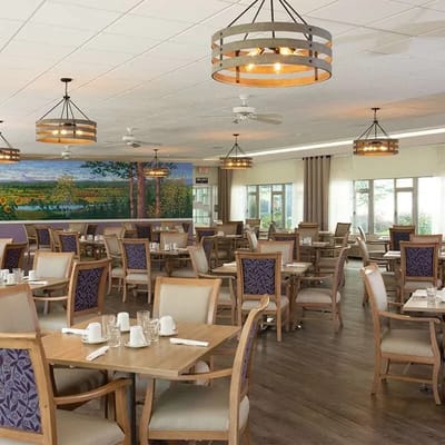 Bright dining room with tables and chairs