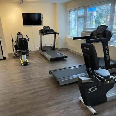 Interior view of a fitness room with exercise equipment