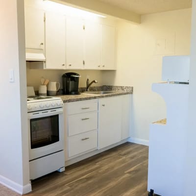 Bright, clean kitchen area with modern appliances
