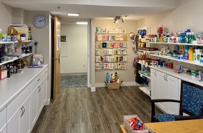 Interior view of a wellness room with shelves of supplies