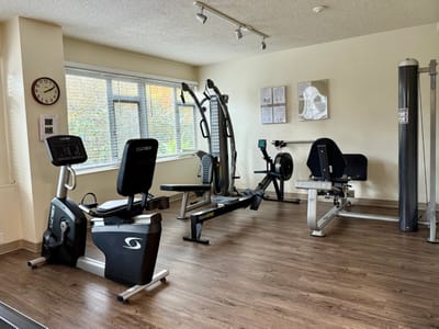 Interior view of a fitness area with exercise equipment