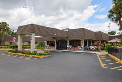 Exterior view of the Life Care Center building with landscaping