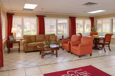 Bright common area with comfortable seating and natural light